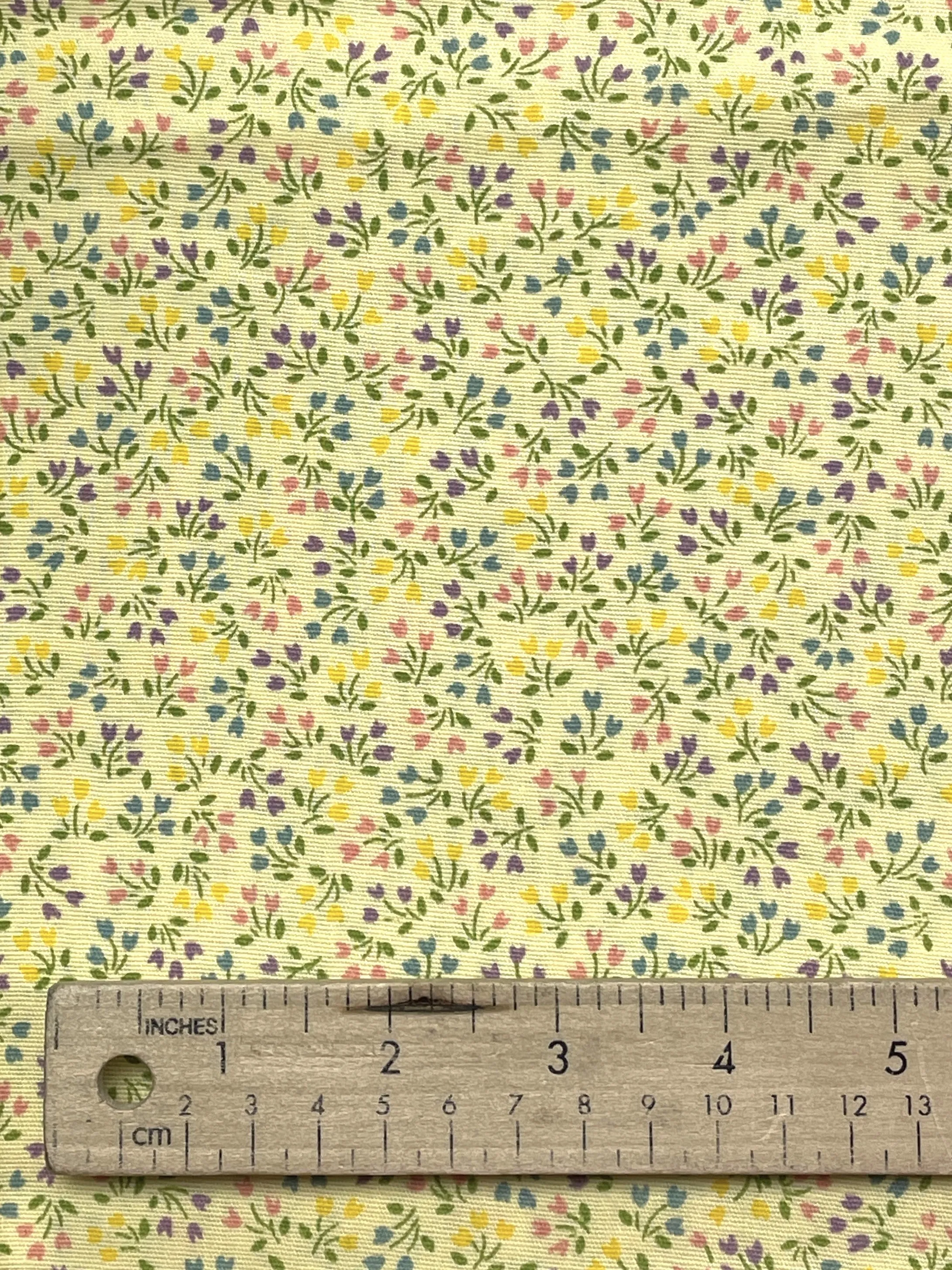 2 YD Poly/Cotton - Yellow with Small Pink, Yellow, Blue and Purple Tulips