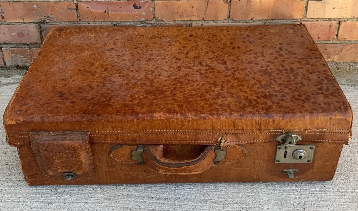 AS FOUND LEATHER SUITCASE