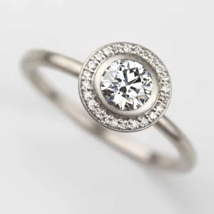 Bezel-set Halo Solitaire Engagement Ring