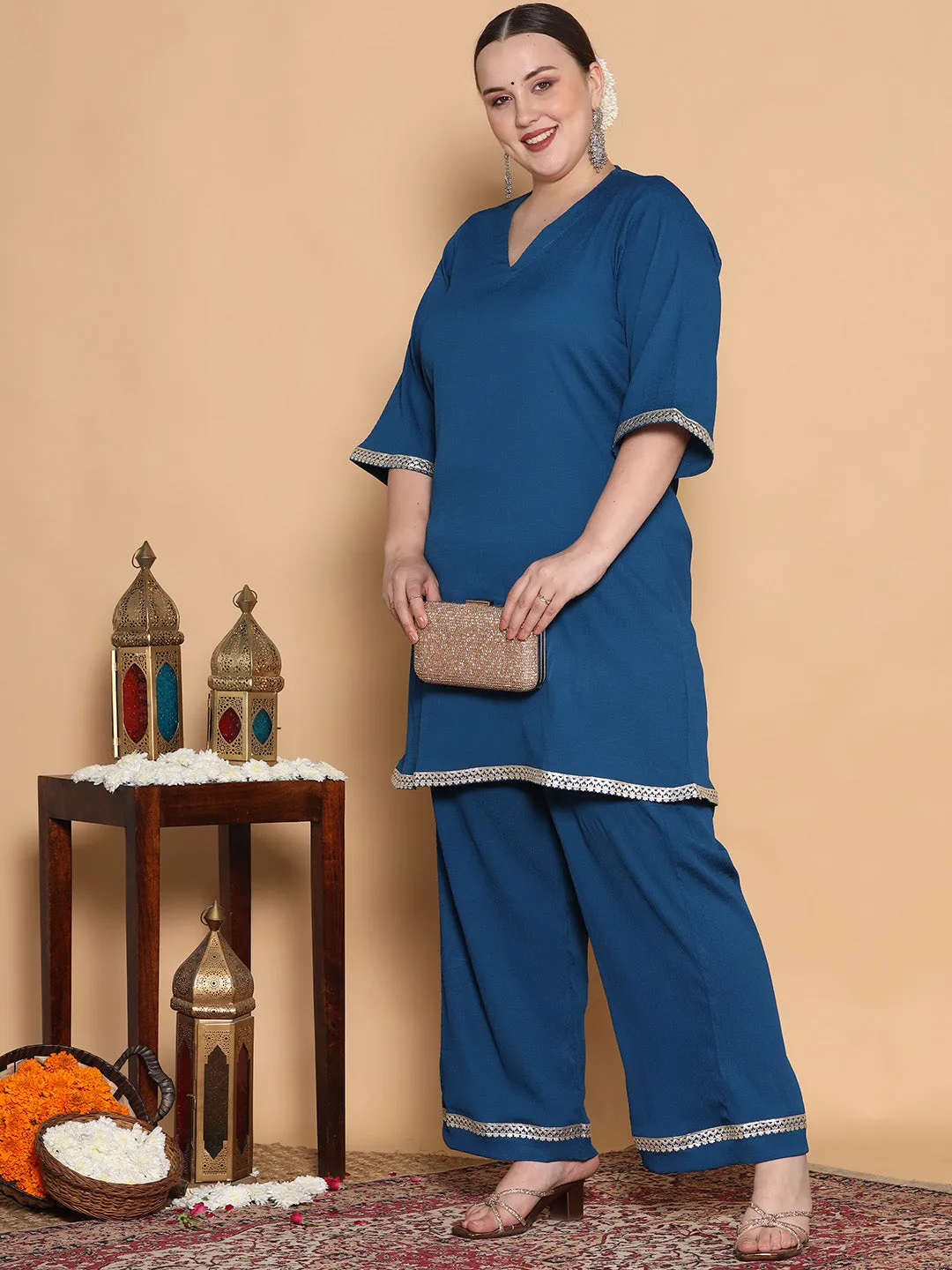 Blue Textured Short Kurti - Embellished