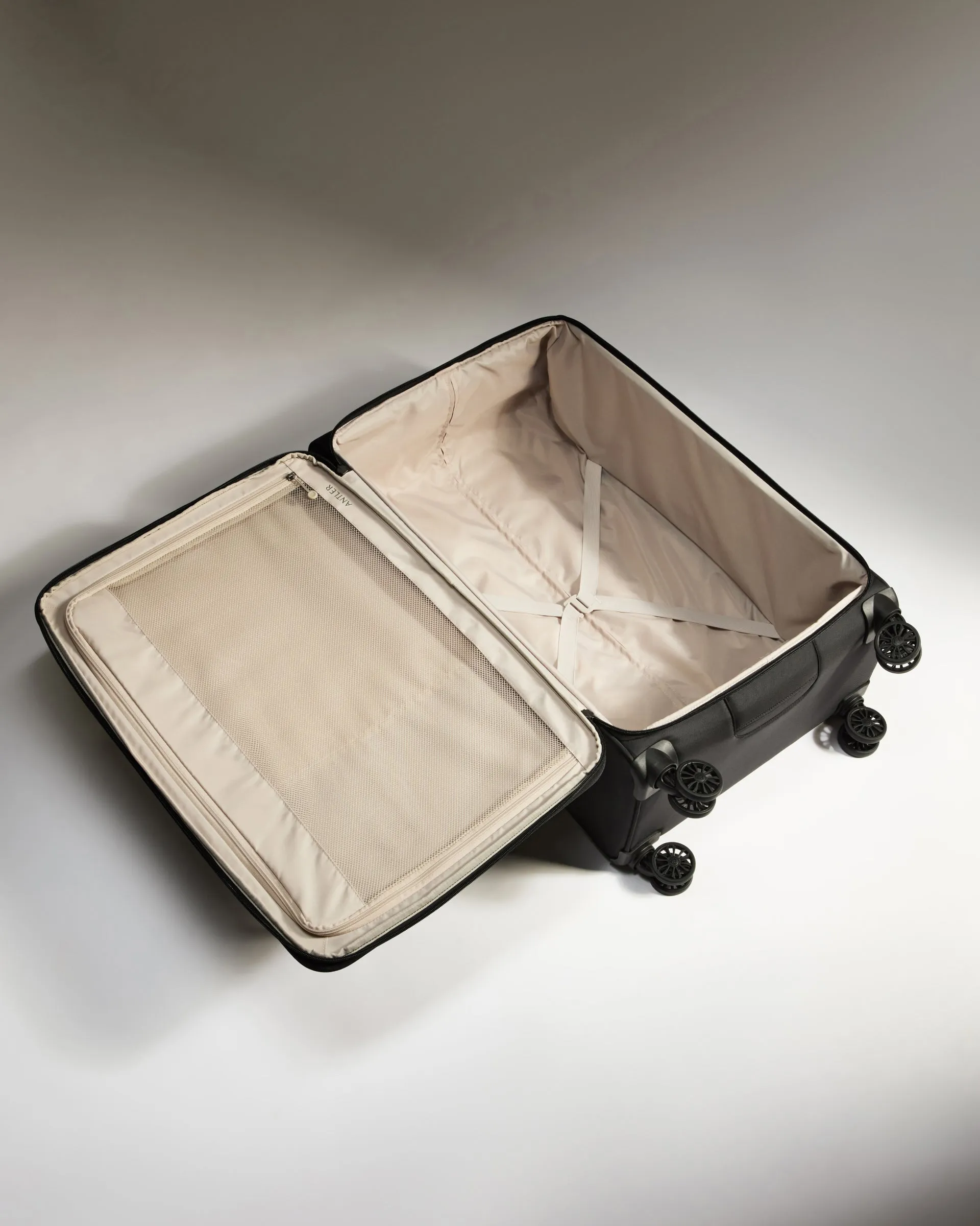 Lightest Large Suitcase in Black - Soft Stripe