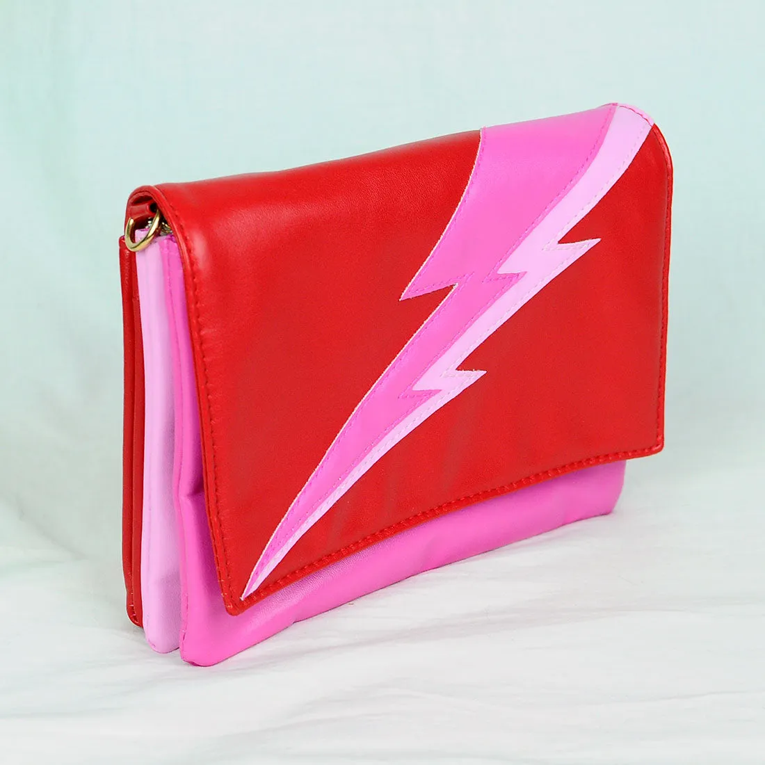 Lightning Bolt Romy Convertible Clutch in Paparazzi