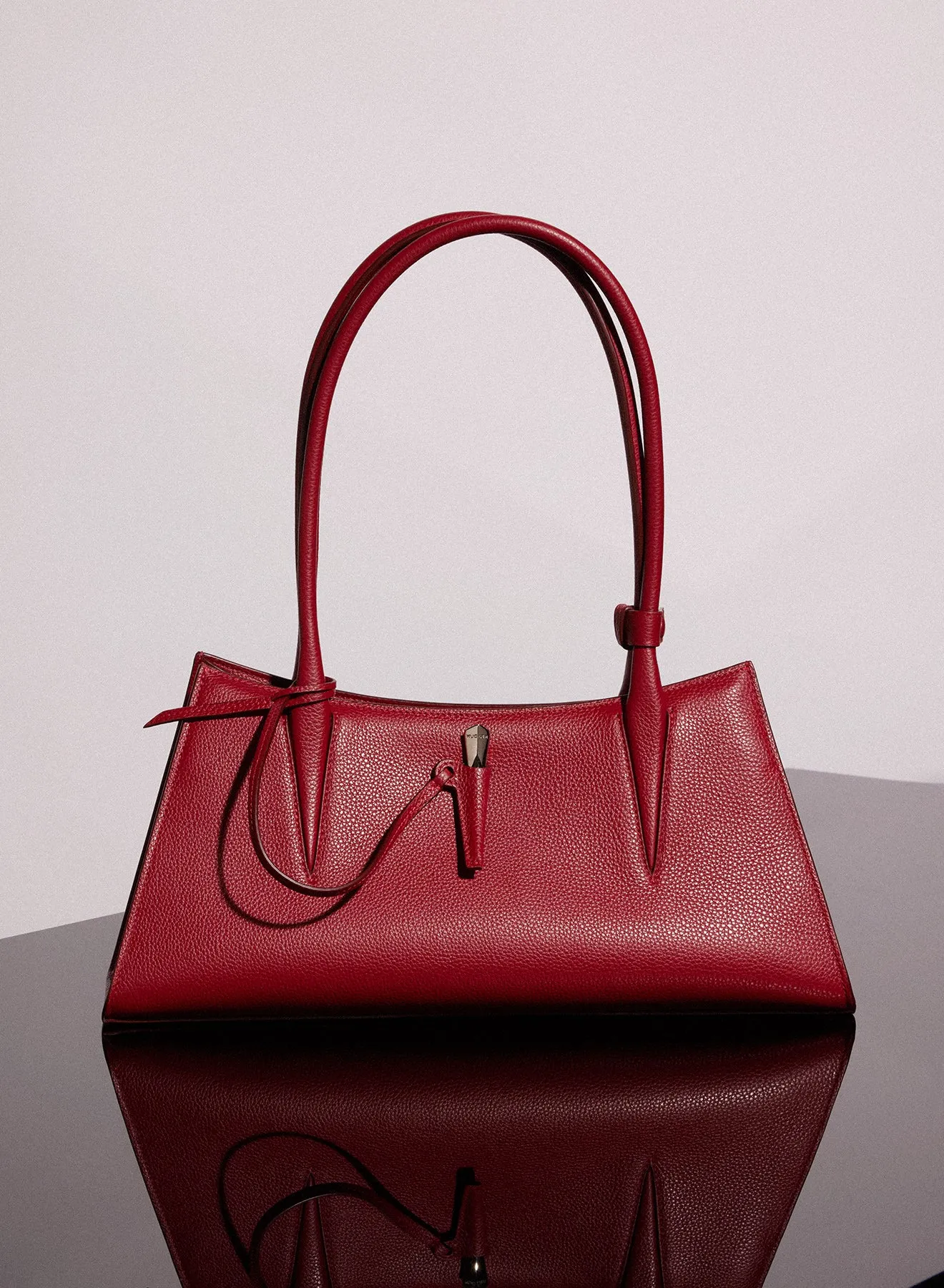 red grained leather fang bag